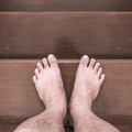 barefoot on stairs istock