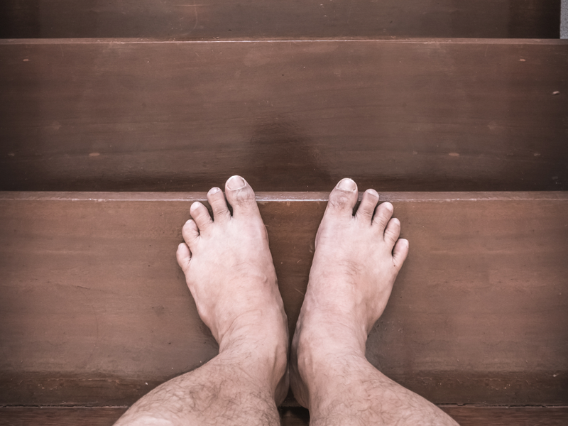barefoot on stairs istock