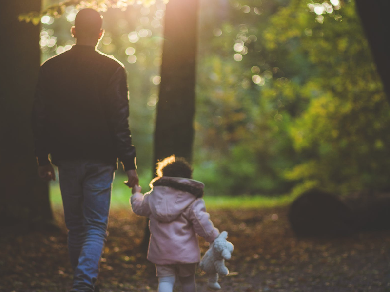 dad and daughter walking