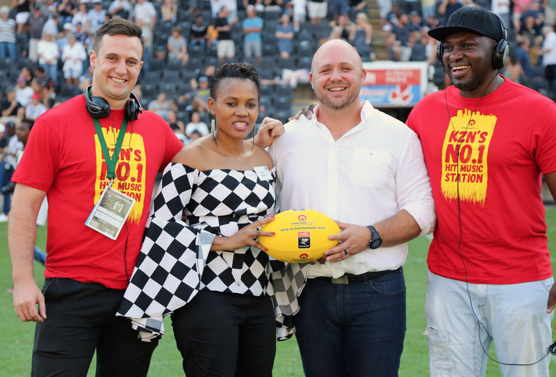 ECR General Manager hands over the yellow ball to The Sharks COO Eduard Coetzee