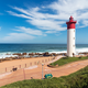 Lighthouse Against Blue Cloudy Coastal Seascape in Umhlanga / iStock