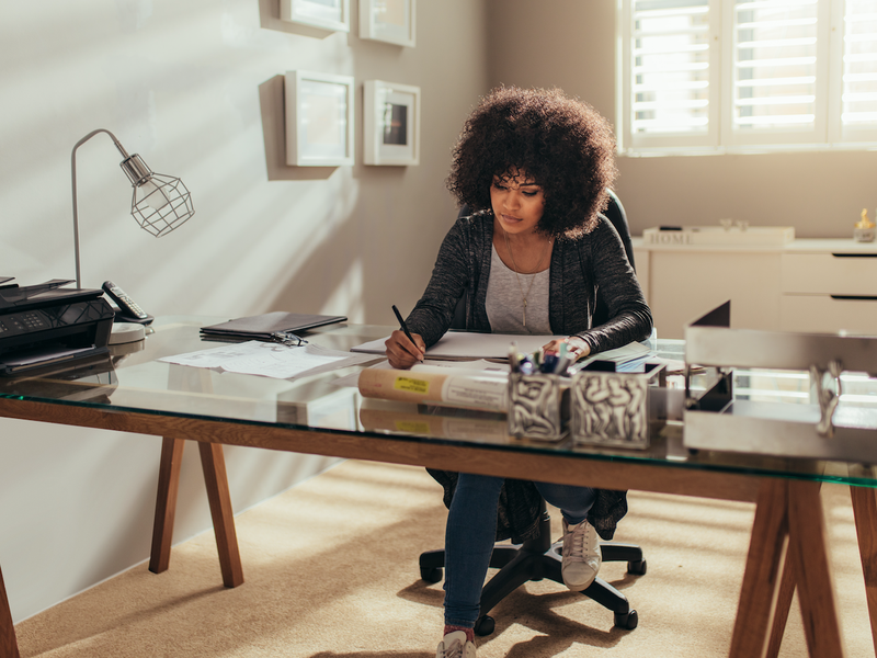 Woman working from home / iStock