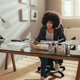 Woman working from home / iStock