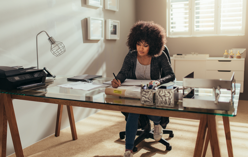 Woman working from home / iStock