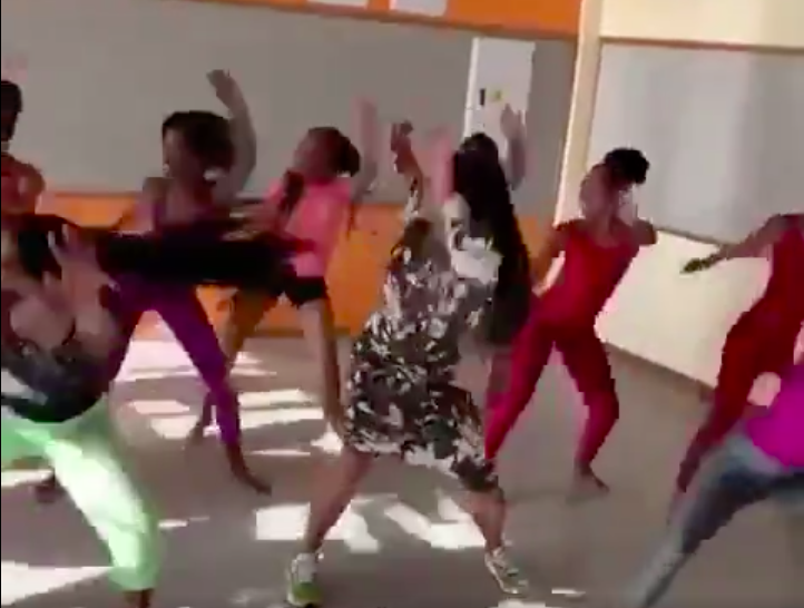 Naomi Campbell dances with school kids in South Africa