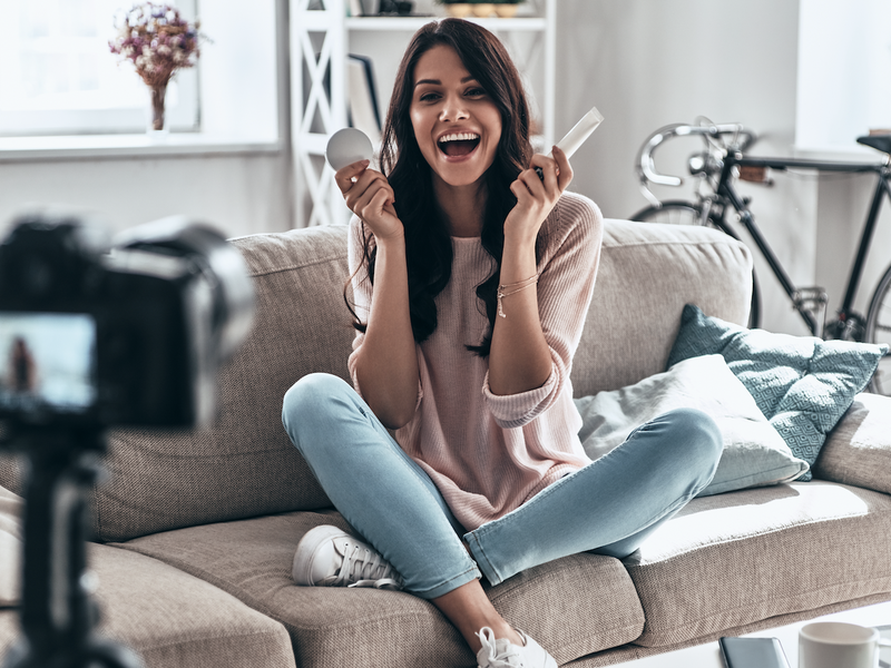 Influencer shooting a vlog / iStock