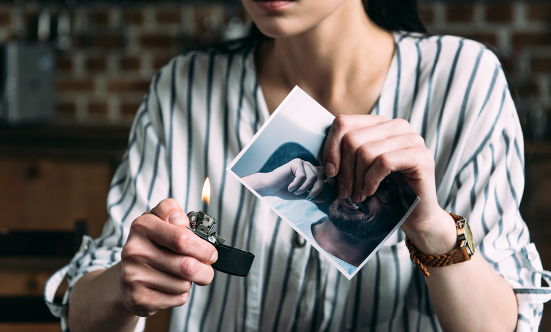 girl burning her boyfriends photo