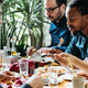 People eating at restaurant / iStock