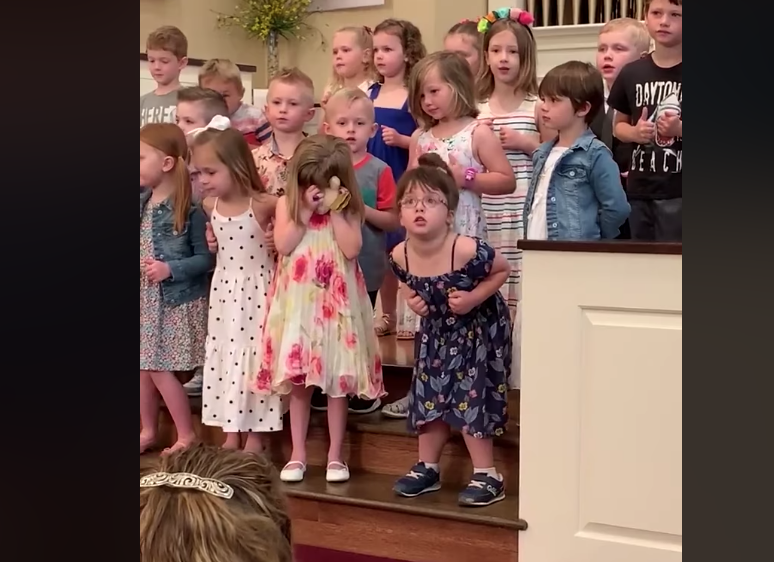 little girl busts dance moves at church