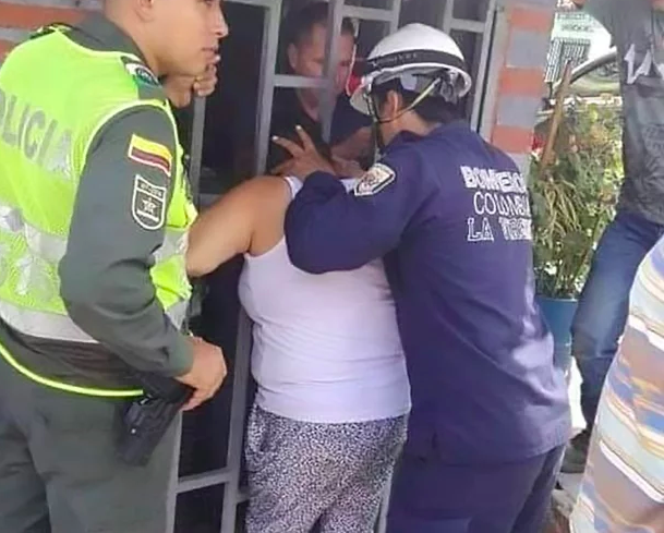 Woman spied on her neighbours and got her head stuck in the gate