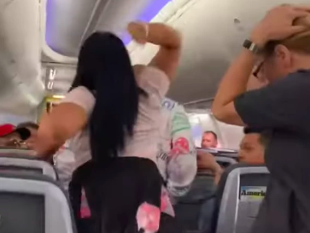Woman smashes laptop