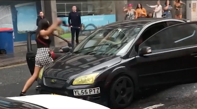 Motorist sends man flying into pole in crazy road rage incident
