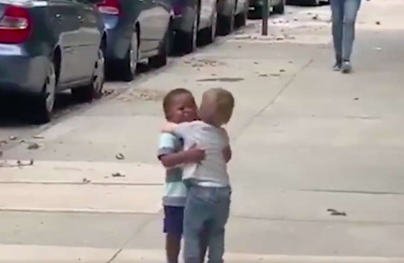 Toddlers hugging