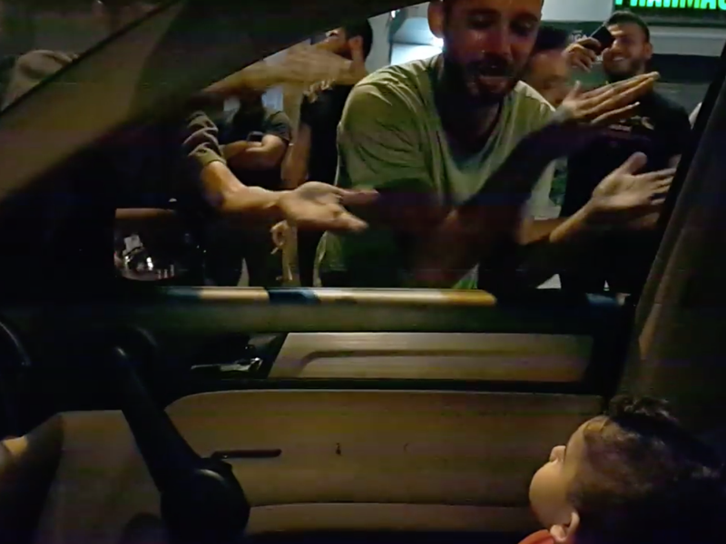 Protesters sing for scared toddler