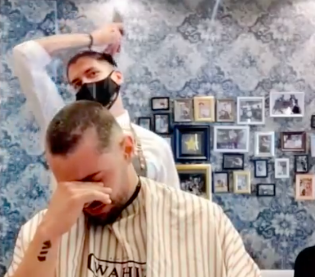 Barber cuts his own hair