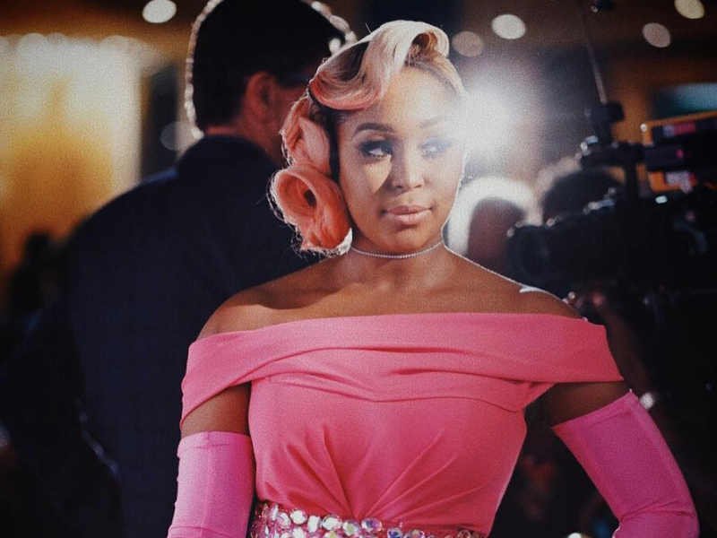 Minnie Dlamini in a pink dress / Instagram