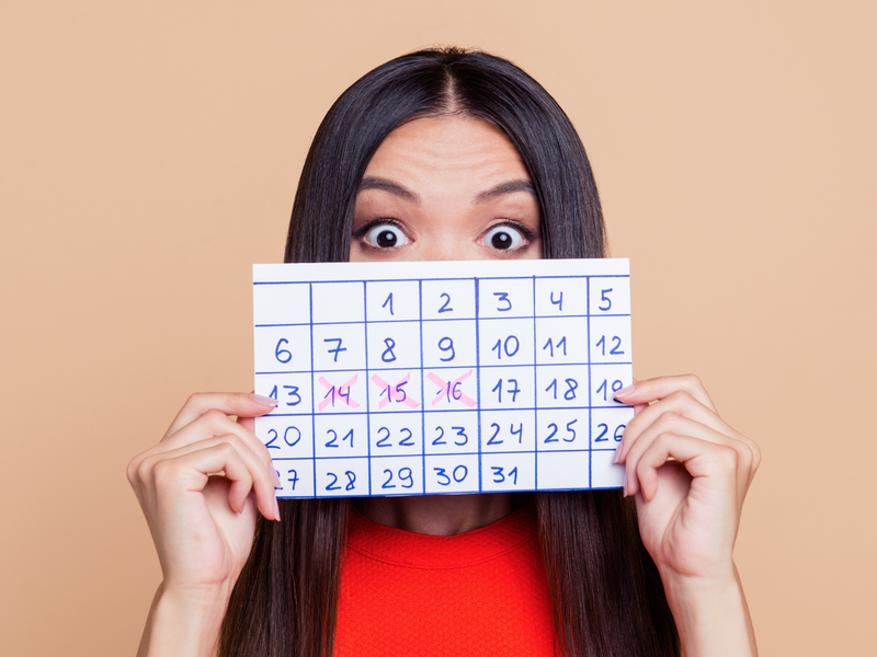 Woman with countdown calendar / iStock
