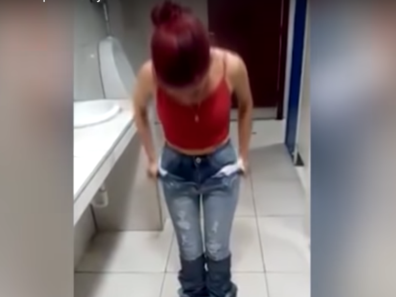 Shoplifter caught wearing nine pairs of jeans at the same time / YouTube