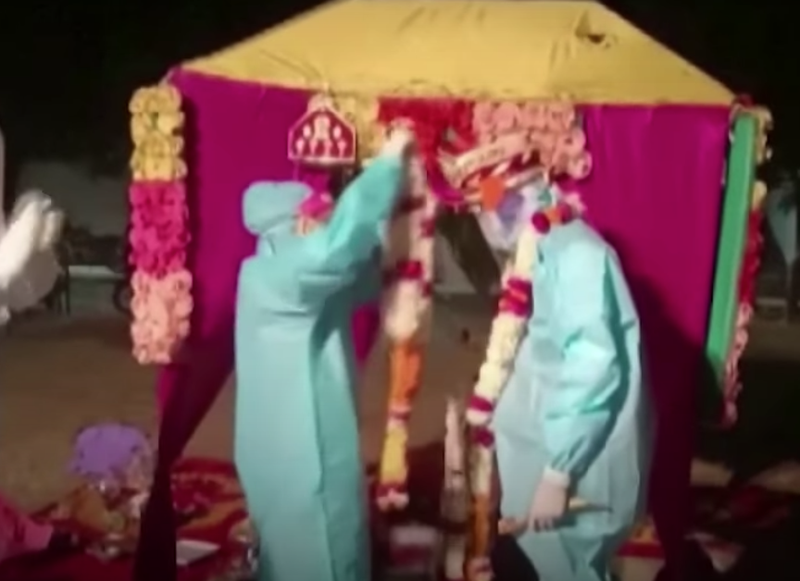 Couple gets married in PPE