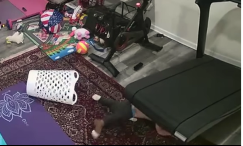 child dragged under treadmill