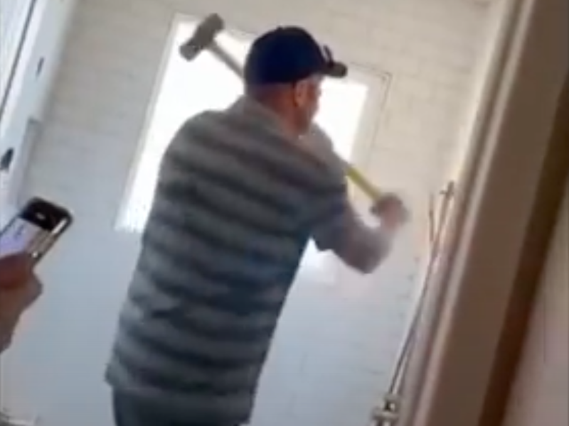 Colorado man smashing bathroom