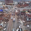 debris and damage from a tornado in Mayfield, Kentucky