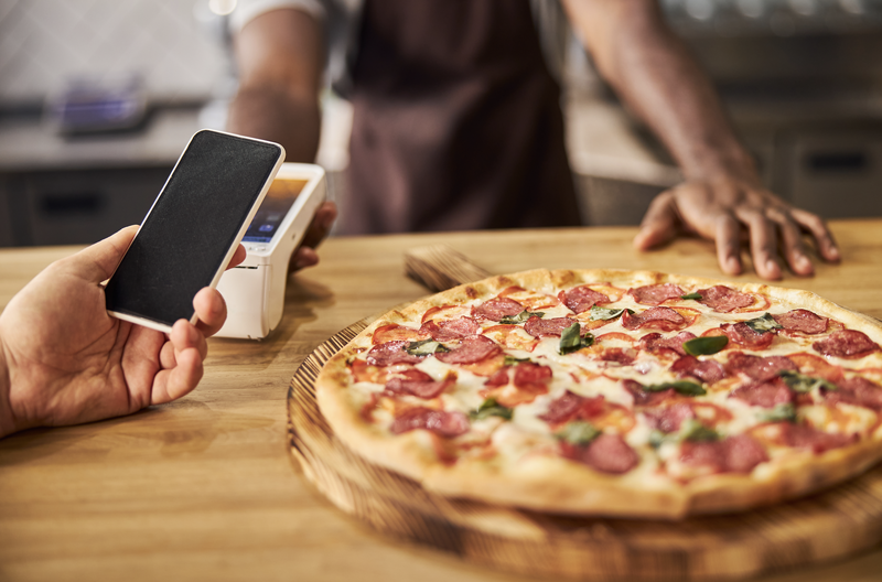 guy buys bitcoin two large pizzas