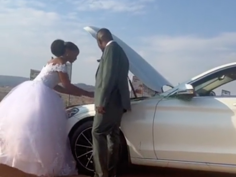 Bride fixing car
