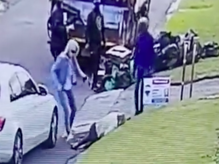 Woman being hit with bat