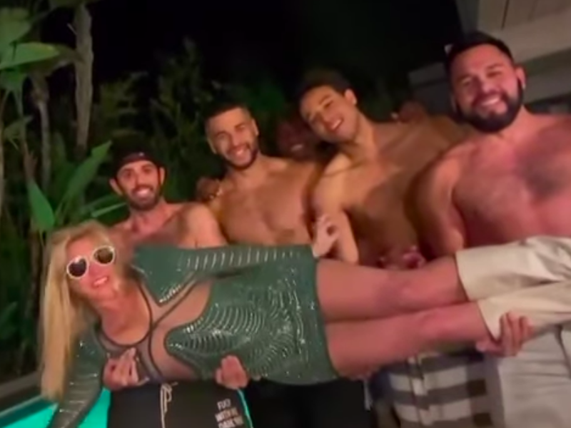 Britney and shirtless men