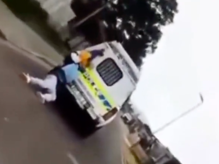 Man dragged in street by police