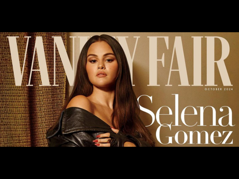 Selena Gomez wearing a black coat and matching gloves