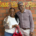 Selvan Naicker an ECR listener stands with Carol Ofori at the ECR offices