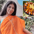 Shamentha Naidoo posing with a saree and a tray of sweetmeats