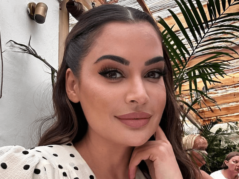 Shashi Naidoo takes a selfie inside a restaurant