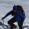 Sibusiso Vilane summitting a snowy mountain