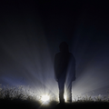 Silhouette man night foggy sky