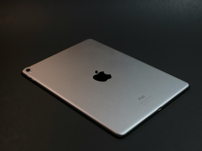Silver ipad lying on a table