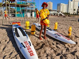 Sisanda at the beach with rescue equipment