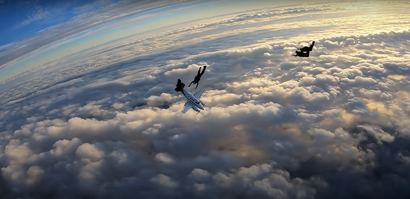 Skydivers almost hit by plane