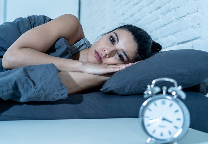 Woman struggling to sleep