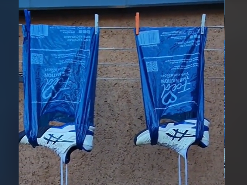 Sneakers drying from two plastic bags