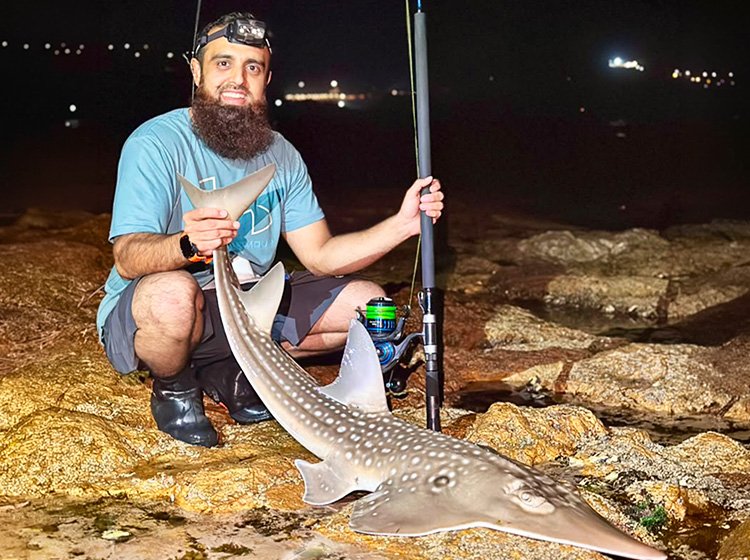 Sohail Olla with a sandshark caught down the lower South Coast
