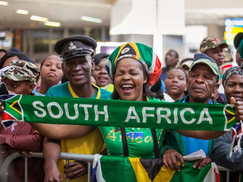 SA scarf held by fan