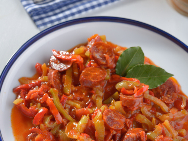 Spiced boerewors on a plate with chakalaka