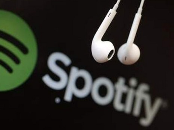 Spotify shares soar as company swings to profit