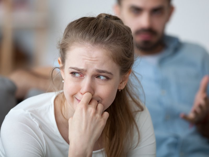 Stressed woman crying feeling depressed