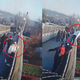 A woman attempts to jump off a bridge