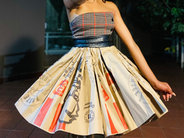 KFC Super fan makes a 'finger-snapping' dress out of the packaging...