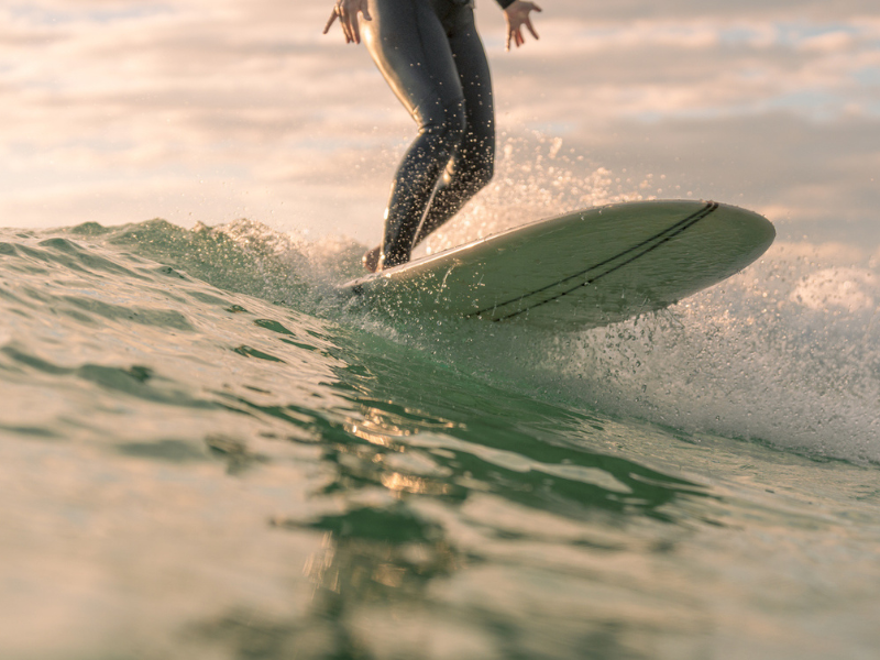 Surfer riding the waves